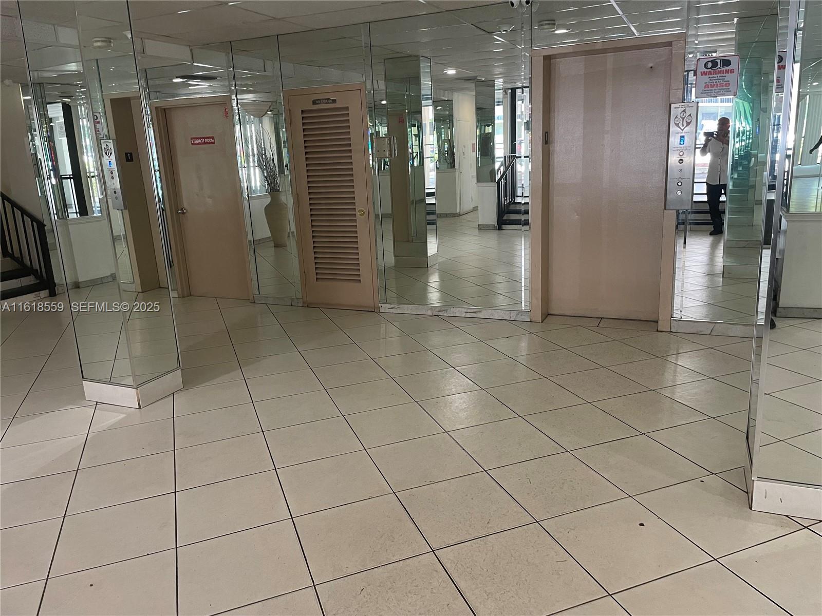 4168 Inverrary Drive, Unit 302 Lauderhill, FL 33319 - Photo 5 of 25 a view of a refrigerator and an empty room