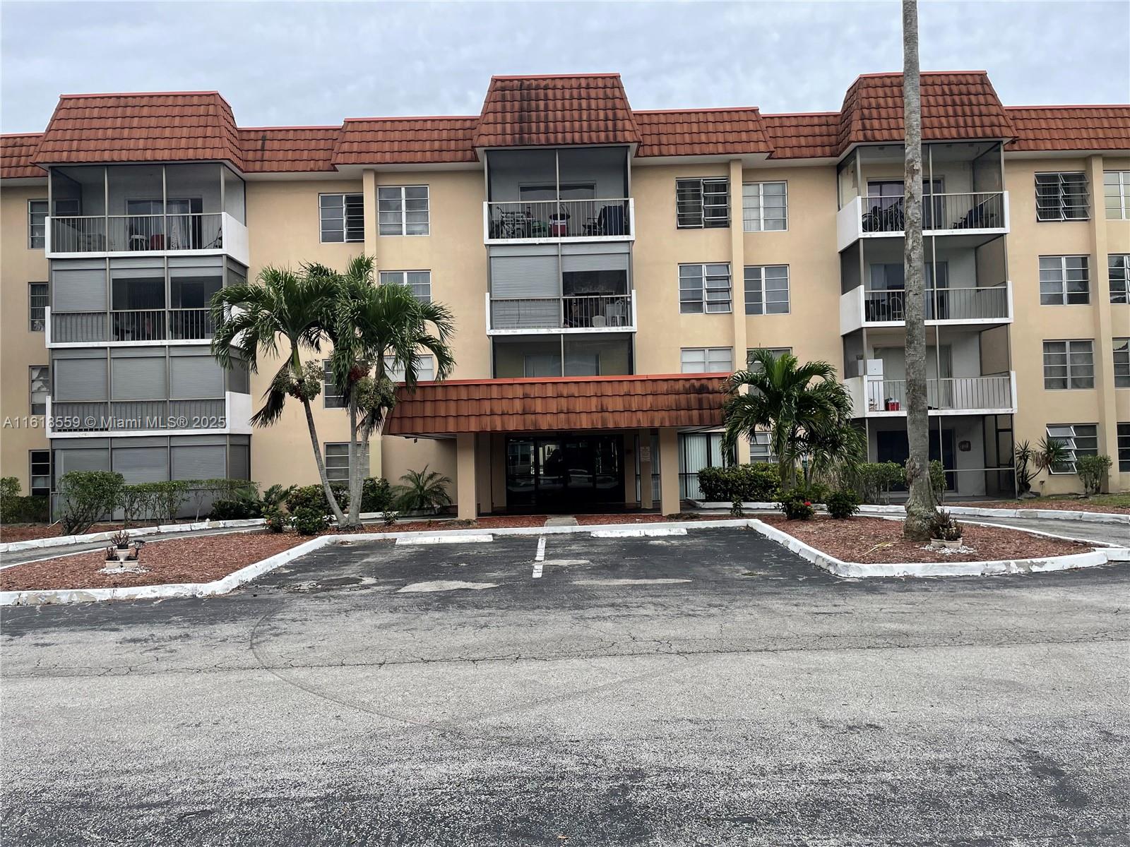 4168 Inverrary Drive, Unit 302 Lauderhill, FL 33319 - Photo 6 of 25 a front view of a building