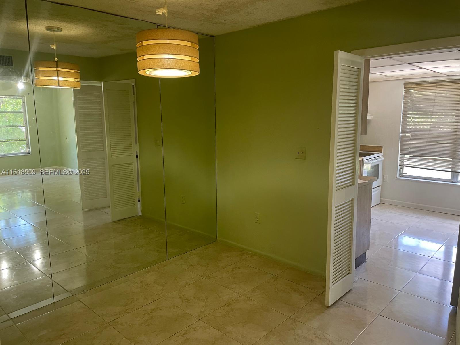 4168 Inverrary Drive, Unit 302 Lauderhill, FL 33319 - Photo 8 of 25 a bathroom with a shower