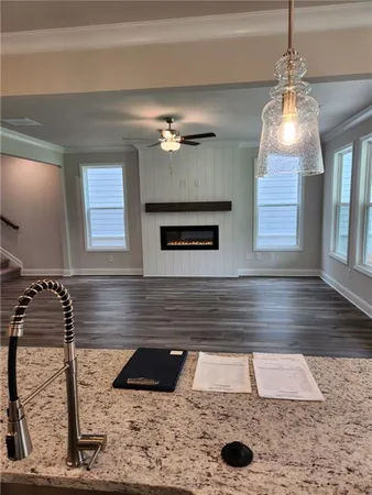 a view of a room with a fan