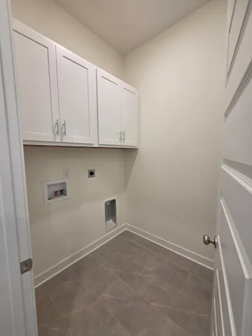 an empty room with cabinet