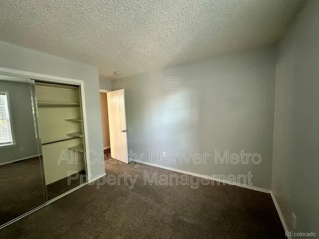 an empty room with closet