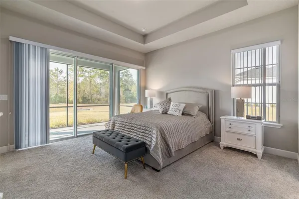 a bathroom with a double vanity sink toilet and shower