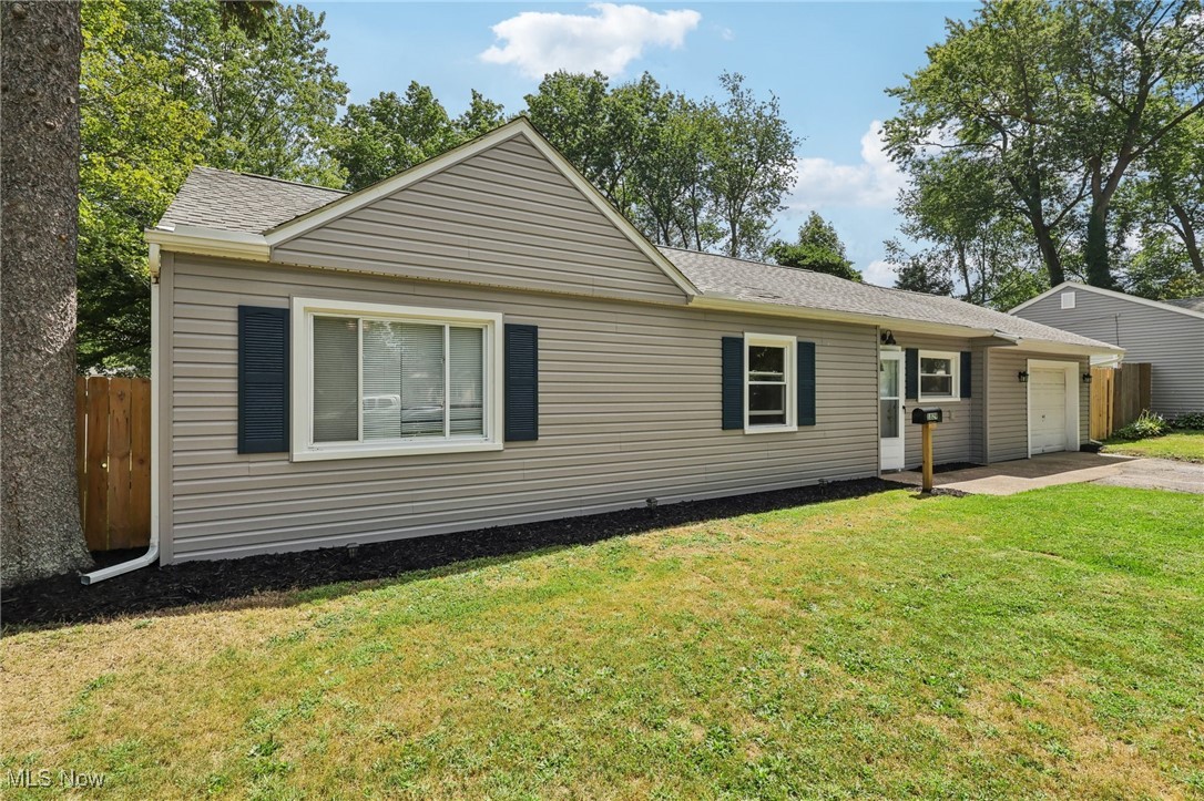 1829 Clyde Road Madison, OH 44057 - Photo 5 of 40 View of front of property featuring a front yard