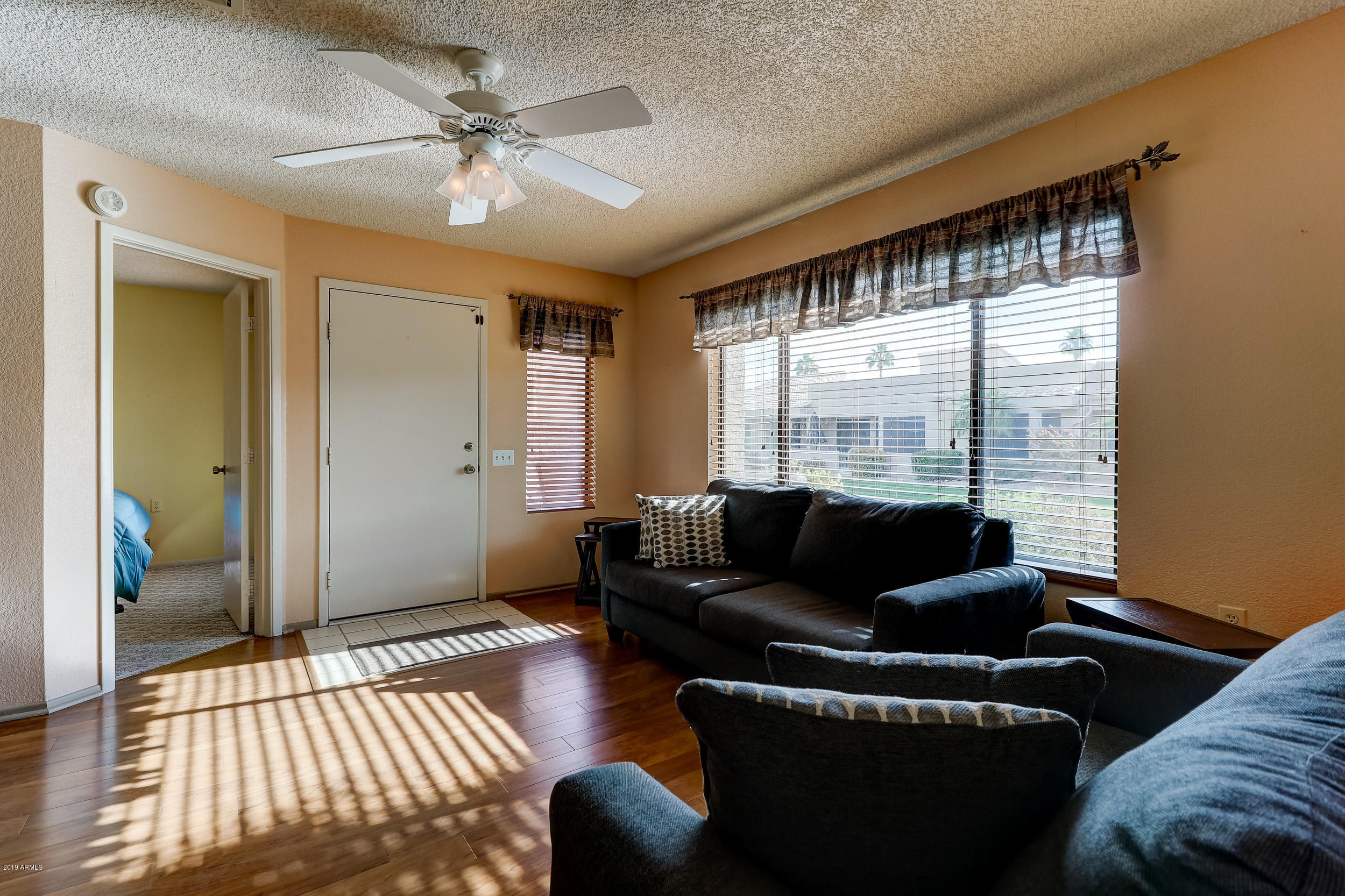 14300 West Bell Road, Unit 497 Surprise, AZ 85374 - Photo 7 of 43 Living Room To Entry View