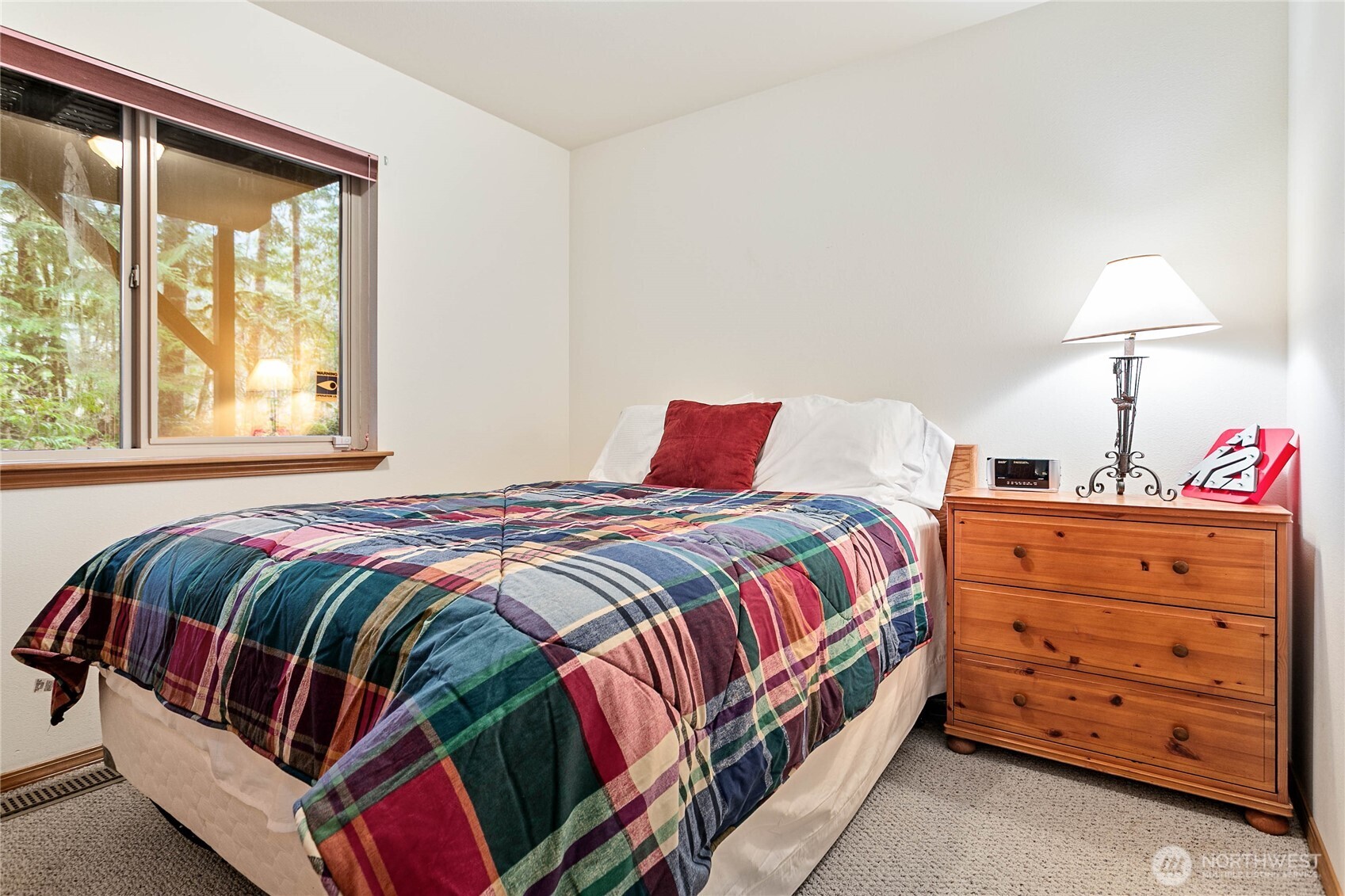 22014 Pinnacle Road Glacier, WA 98244 - Photo 20 of 31 a bedroom with a bed and a window