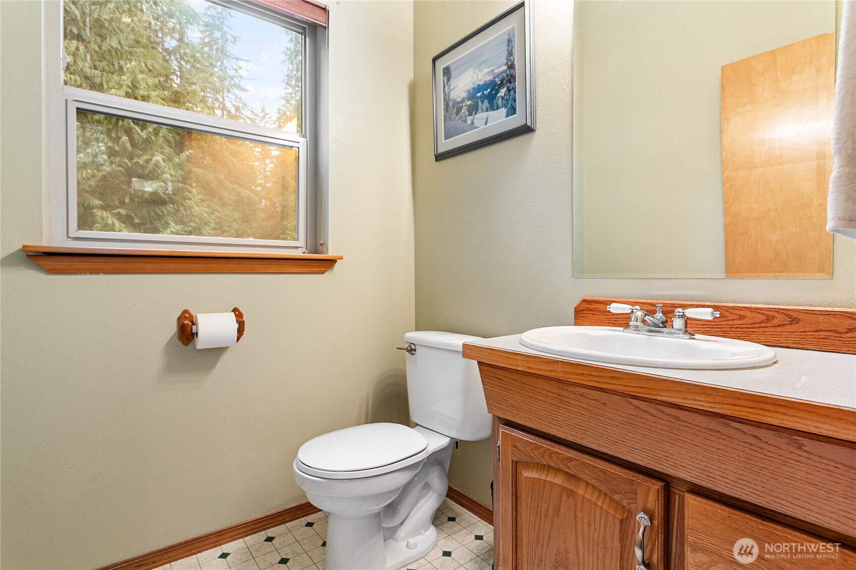 22014 Pinnacle Road Glacier, WA 98244 - Photo 21 of 31 a bathroom with a sink a toilet and a window