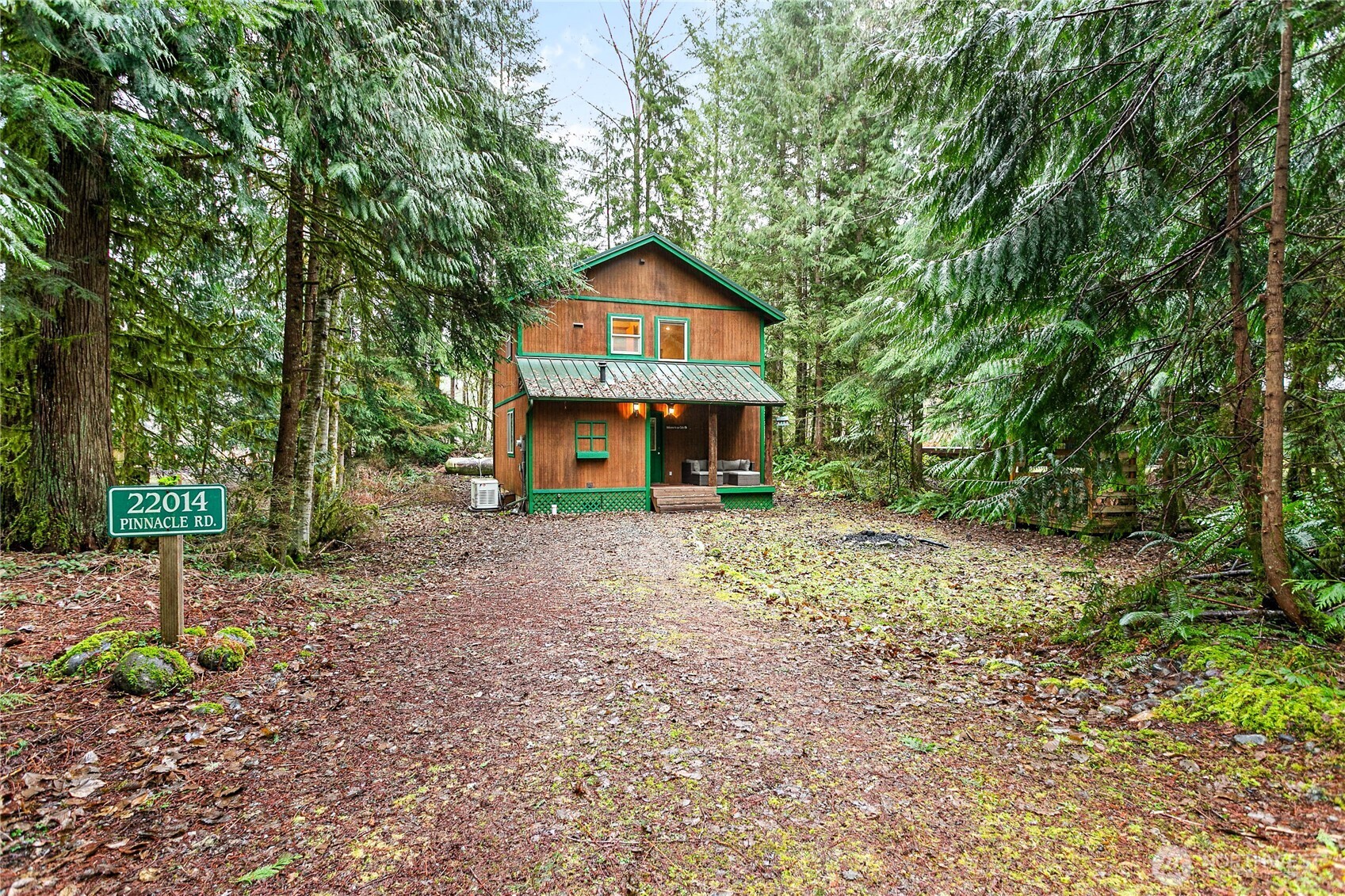 22014 Pinnacle Road Glacier, WA 98244 - Photo 27 of 31 a front view of a house with a yard and tree