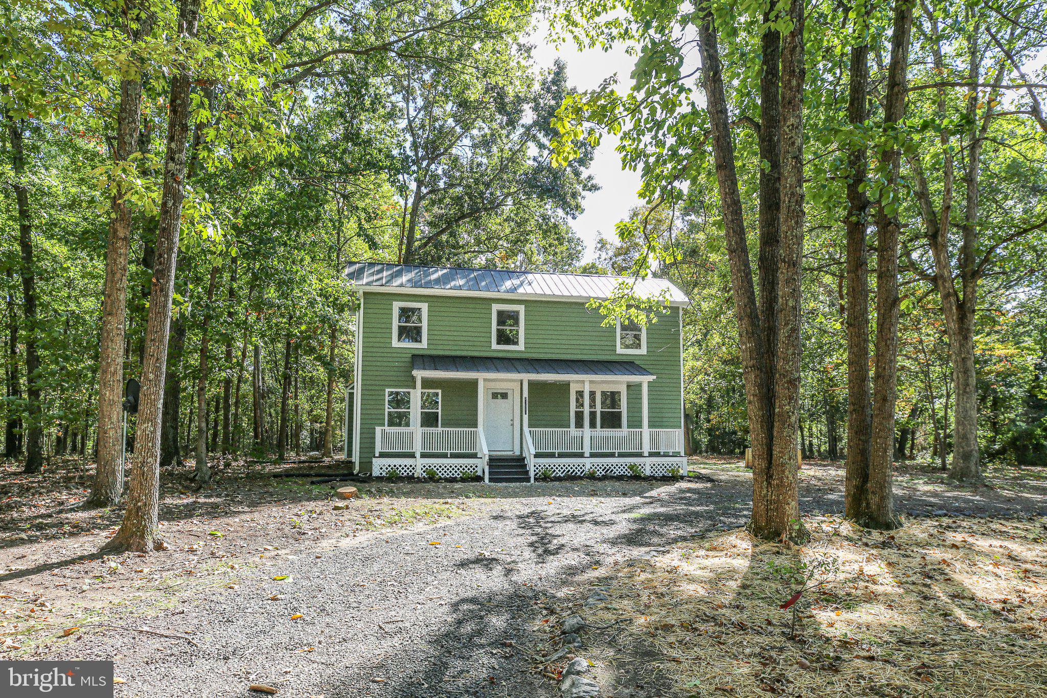 Home has a convenient wrap around driveway