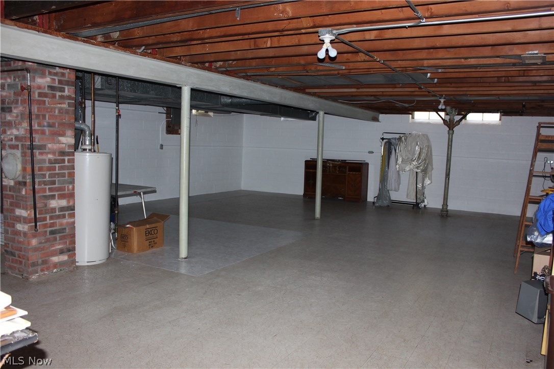 943 Roland Road Lyndhurst, OH 44124 - Photo 14 of 17 There is a full, unfinished basement for storage or extra living spaces, if finished out.