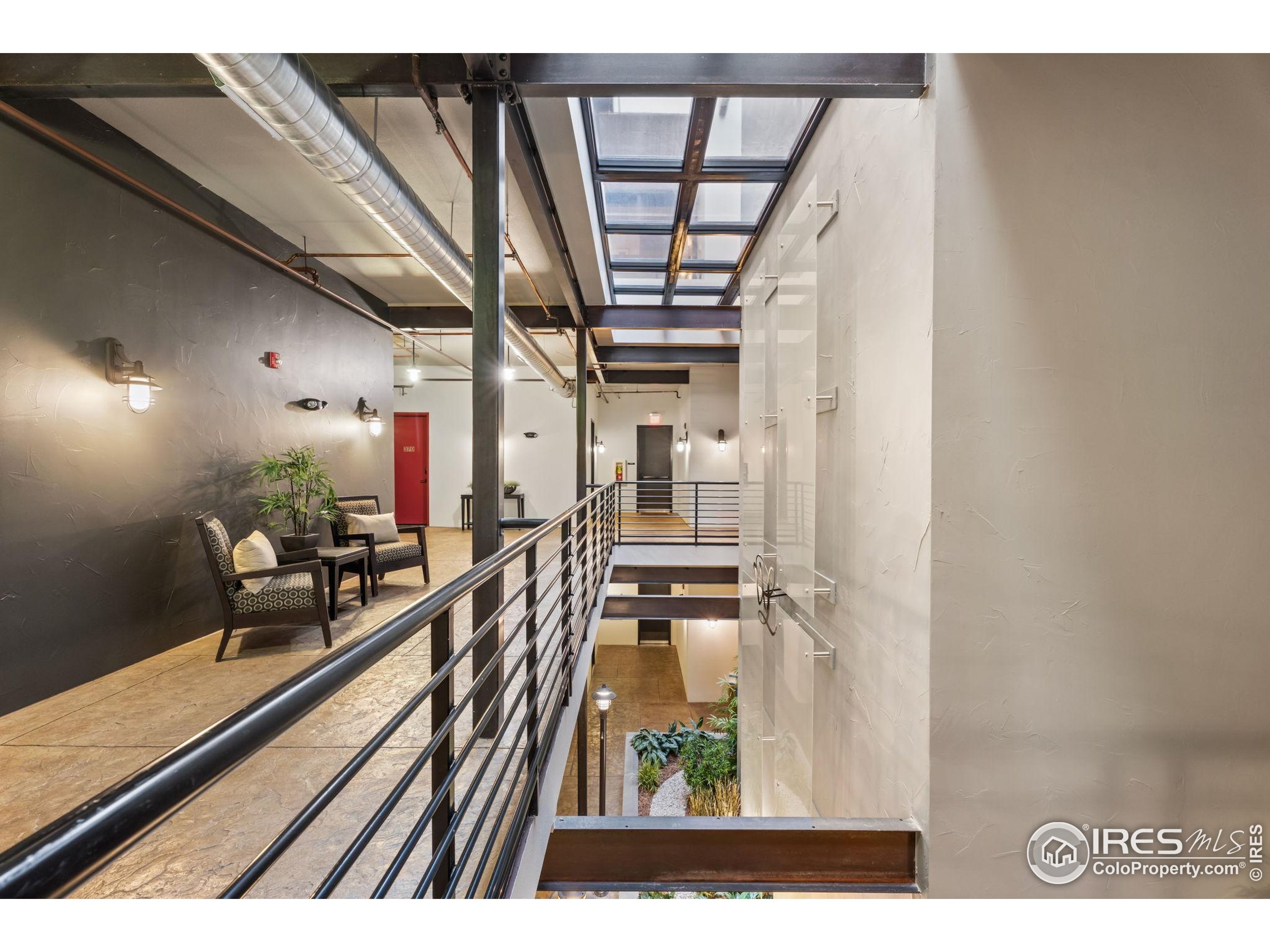210 West Magnolia Street, Unit 320 Fort Collins, CO 80521 - Photo 3 of 45 a view of a living room with furniture