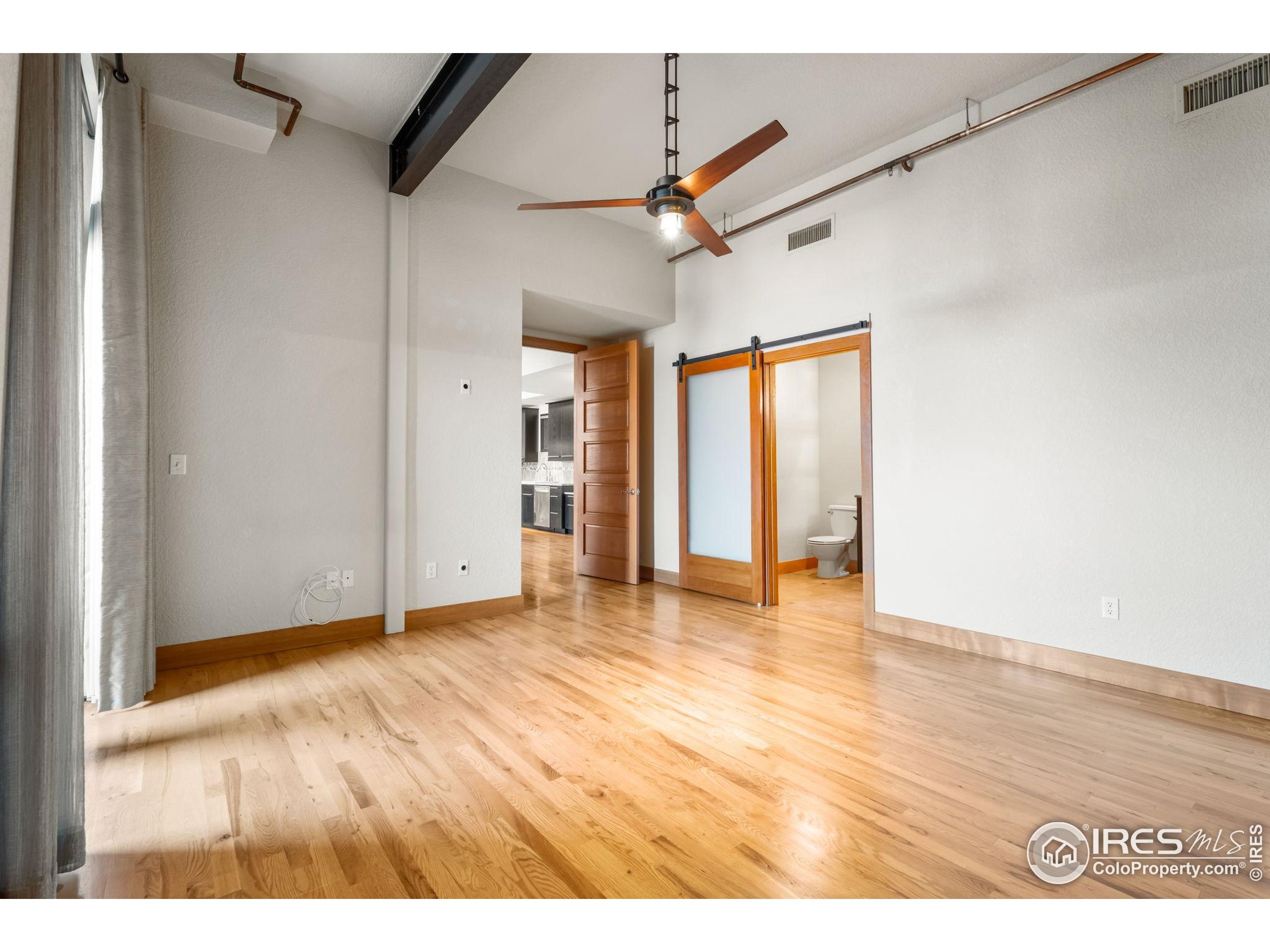 210 West Magnolia Street, Unit 320 Fort Collins, CO 80521 - Photo 31 of 45 a view of an empty room with a window