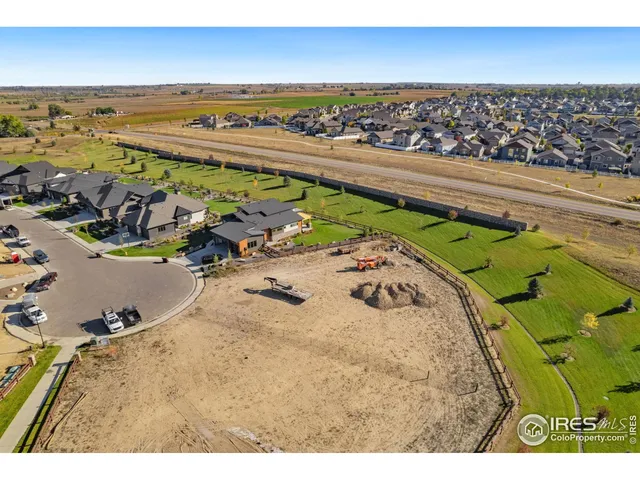 an aerial view of residential house with outdoor space