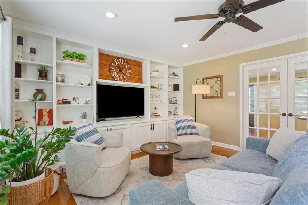 2209 North 52nd Street Waco, TX 76710 - Photo 2 of 34 a living room with furniture and a flat screen tv