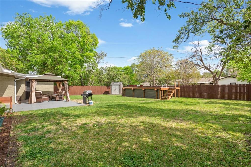 2209 North 52nd Street Waco, TX 76710 - Photo 28 of 34 a view of a house with backyard