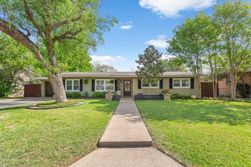 2209 North 52nd Street Waco, TX 76710 - Photo 4 of 34 front view of a house with a yard