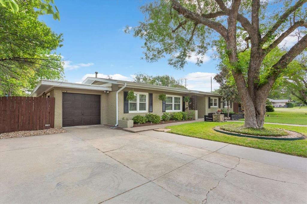 2209 North 52nd Street Waco, TX 76710 - Photo 5 of 34 a view of a house with a yard