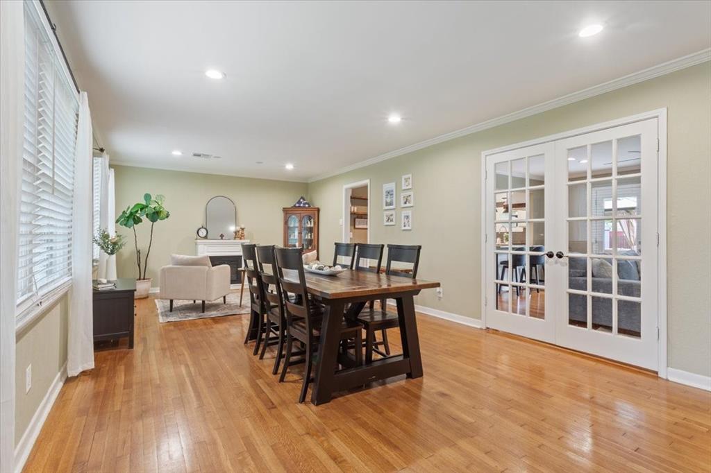 2209 North 52nd Street Waco, TX 76710 - Photo 9 of 34 a view of a dining room with furniture and wooden floor