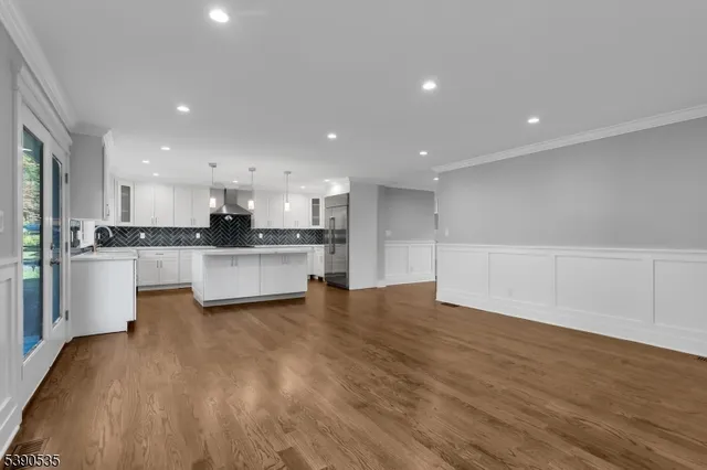 a view of kitchen with wooden floor