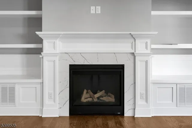 a living room with a fireplace