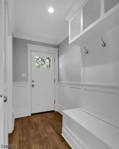 a view of bathroom with bathtub and window