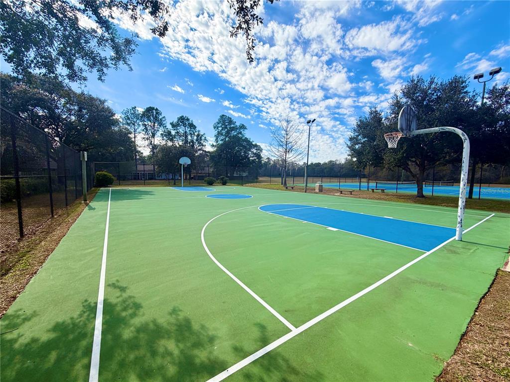 4423 Northwest 36th Street Gainesville, FL 32605 - Photo 38 of 43 a view of a tennis ground