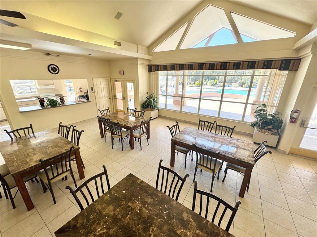 4423 Northwest 36th Street Gainesville, FL 32605 - Photo 40 of 43 a view of a dining room with furniture window and outside view