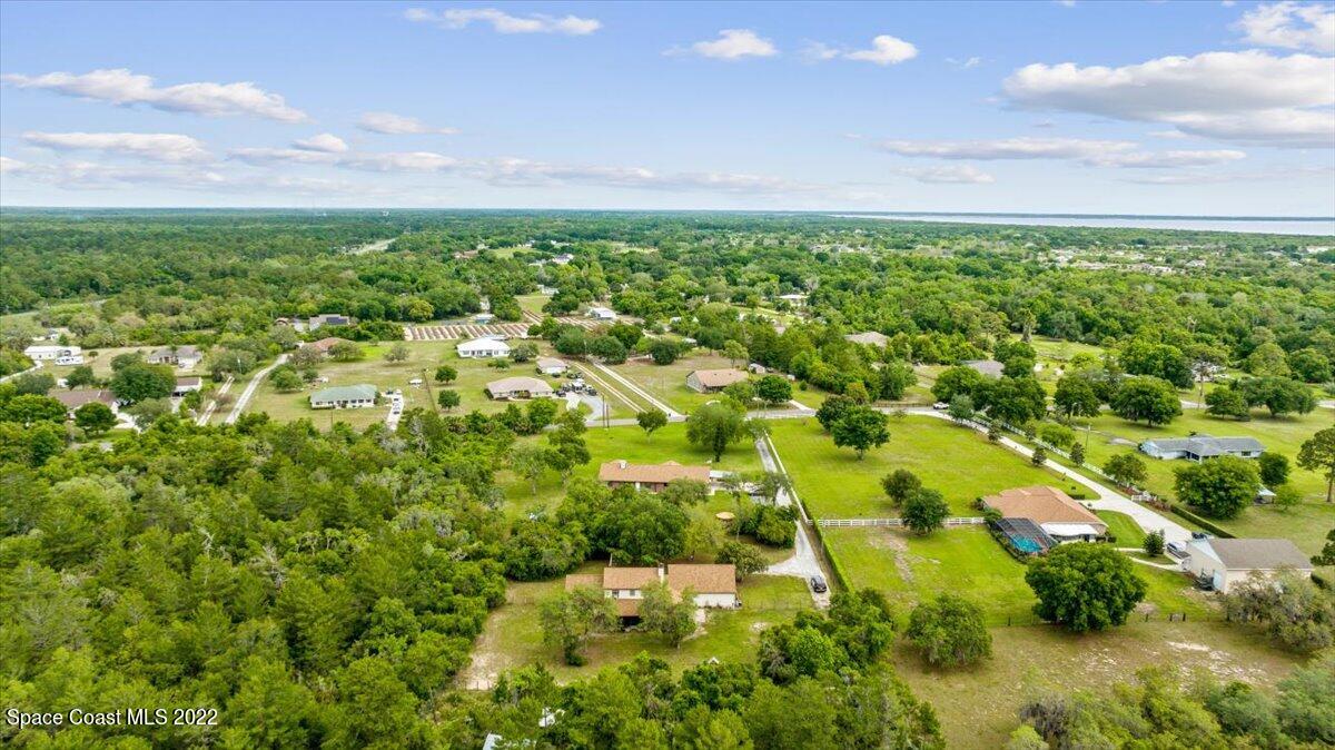 3655 Grant Line Road Mims, FL 32754 - Photo 45 of 47 a view of yard with swimming pool