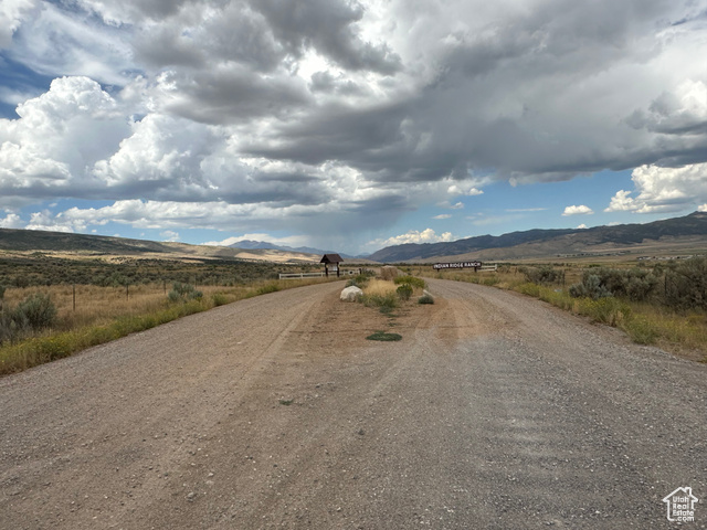 13 West Indian Ridge Drive South Fairview, UT 84629 - Photo 11 of 12 View of dirt / gravel road with a mountain view and a view of rural / pastoral area