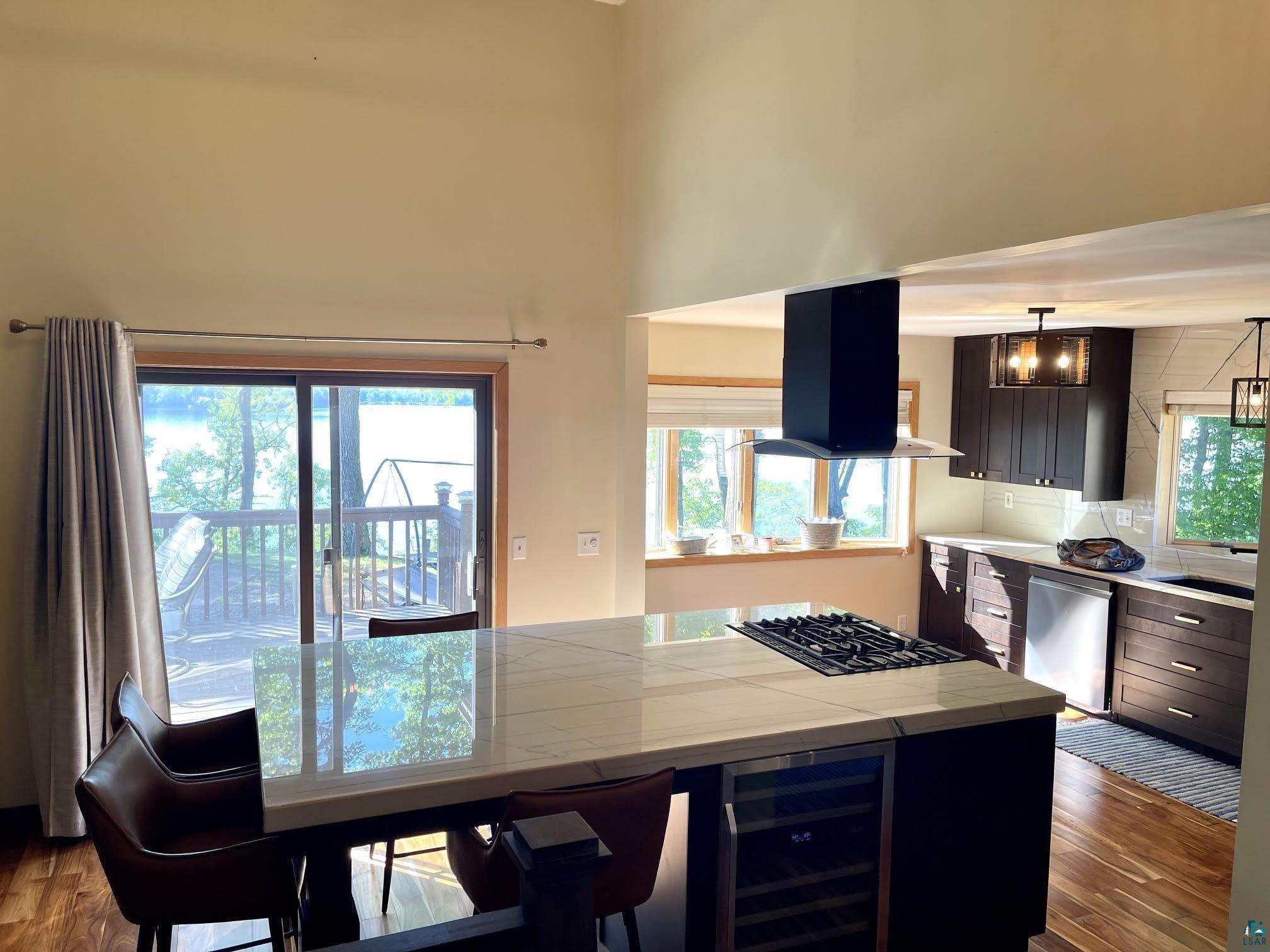 37460 Sunrise View Road Sturgeon Lake, MN 55783 - Photo 14 of 50 Dining area lake view deck access.