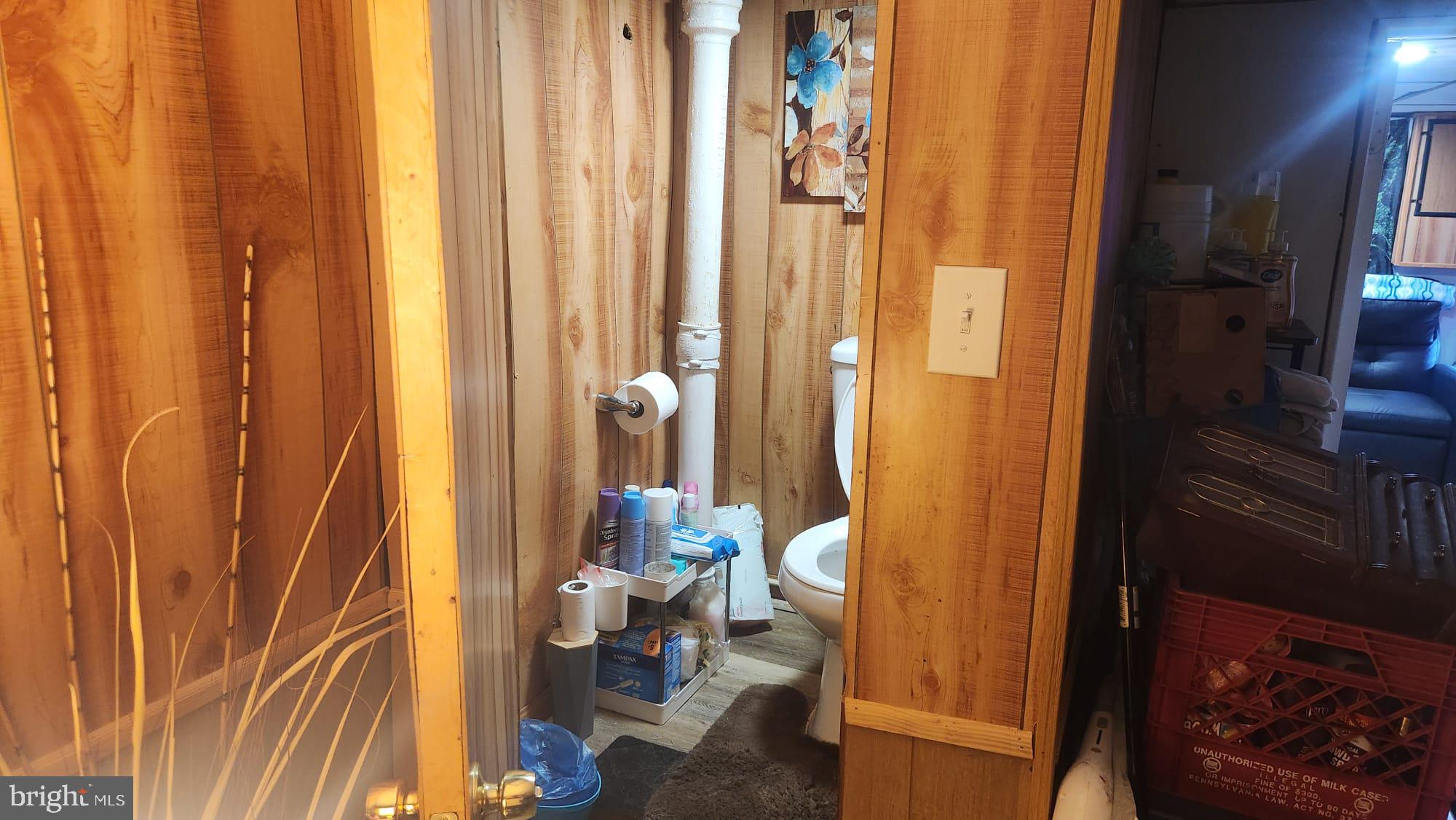4432 Manorview Road Baltimore, MD 21229 - Photo 21 of 24 Cozy bathroom with rustic charm.