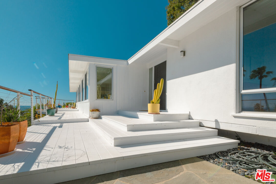 20647 Seaboard Road Malibu, CA 90265 - Photo 3 of 35 a outdoor space with the couches and view of living room