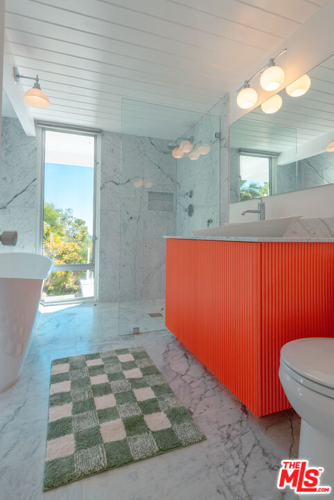 20647 Seaboard Road Malibu, CA 90265 - Photo 10 of 35 a bathroom with a sink and a mirror