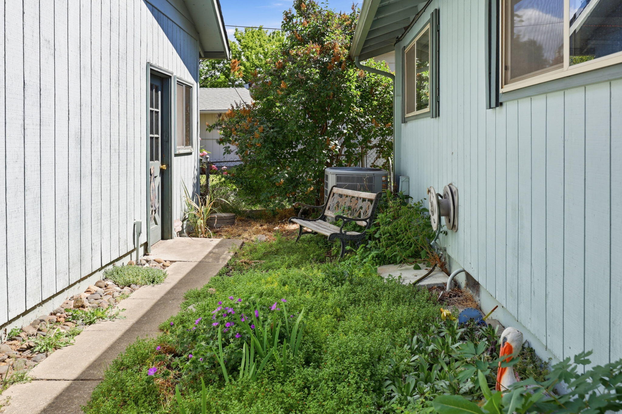 102 Elm Street Phoenix, OR 97535 - Photo 27 of 28 a view of a backyard with pathway