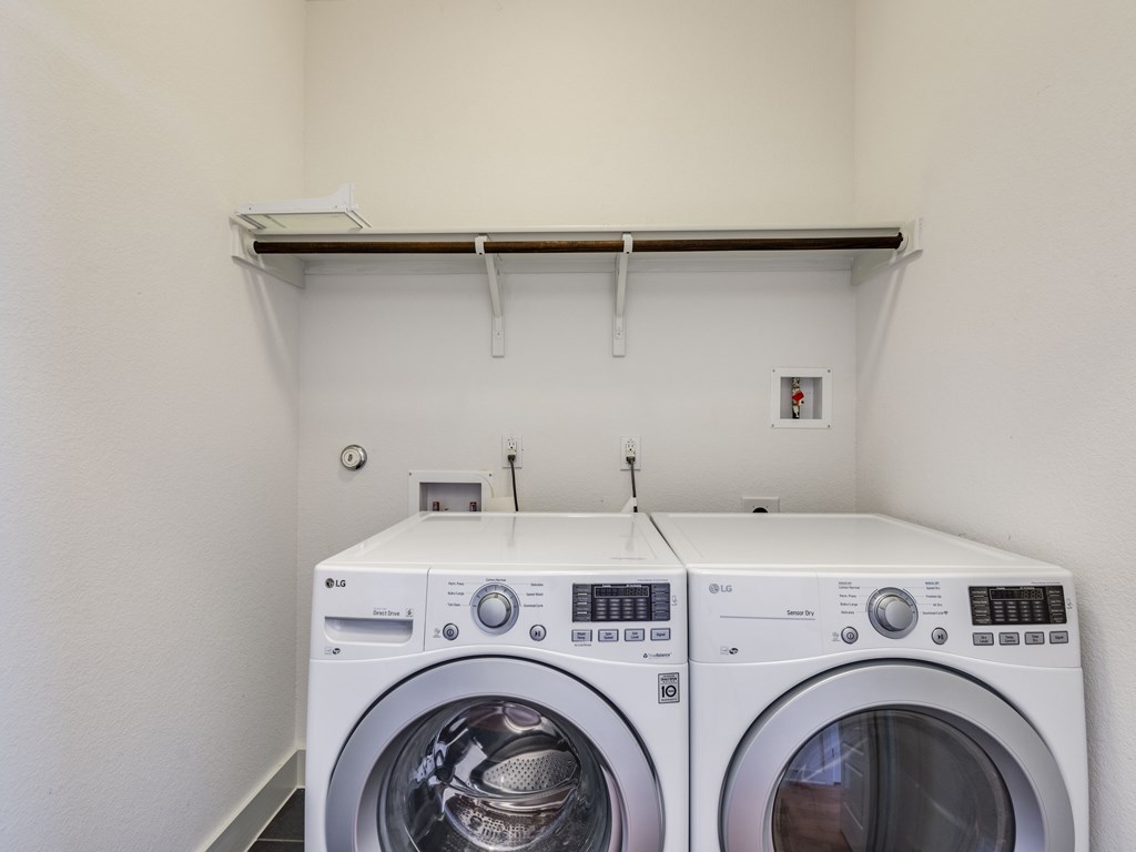 2208 Capulet Street Austin, TX 78741 - Photo 19 of 23 a utility room with dryer and washer