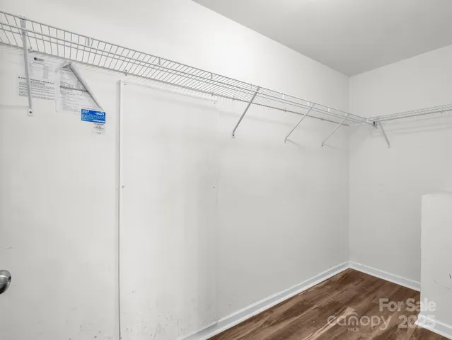 a view of a room with racks on the wall