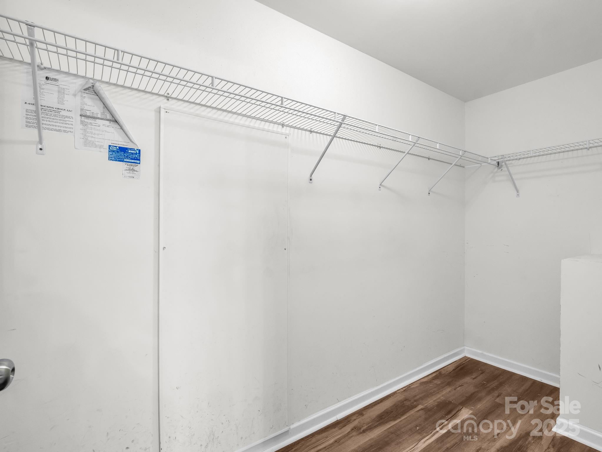 663 Landrum Road Columbus, NC 28722 - Photo 16 of 40 a view of a room with racks on the wall