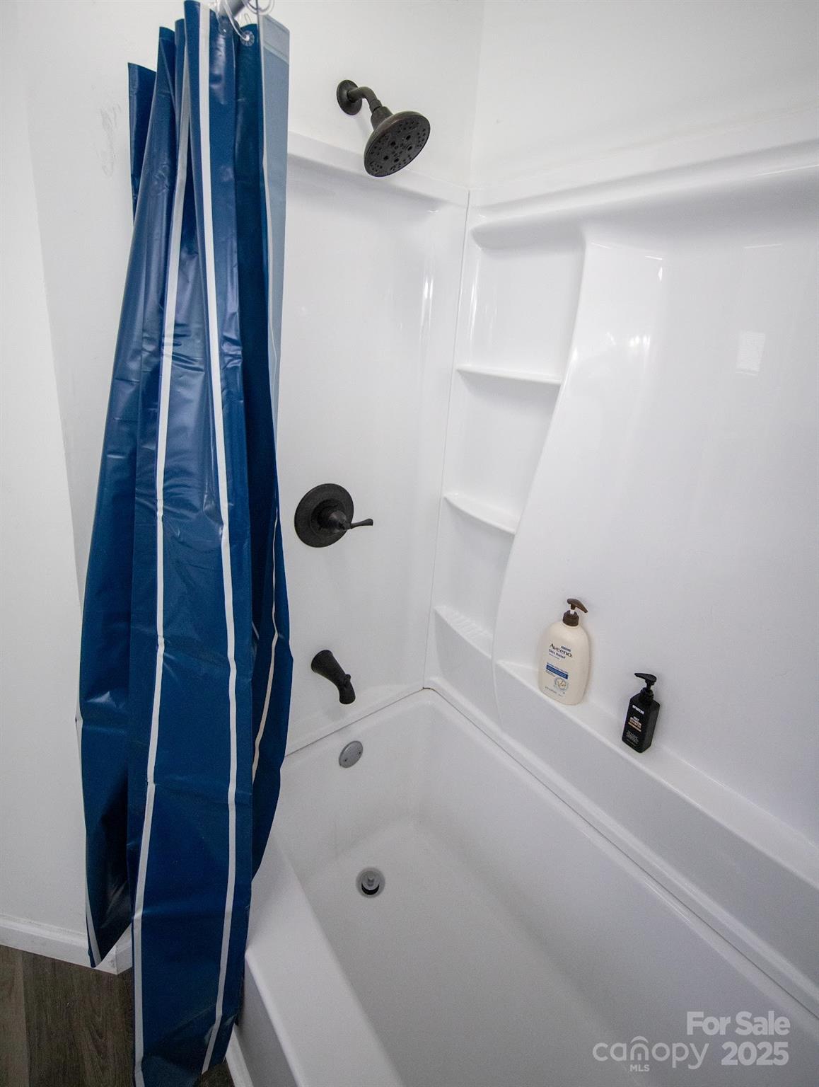717 Pine Mountain Road Hudson, NC 28638 - Photo 29 of 31 a bathroom with a tub