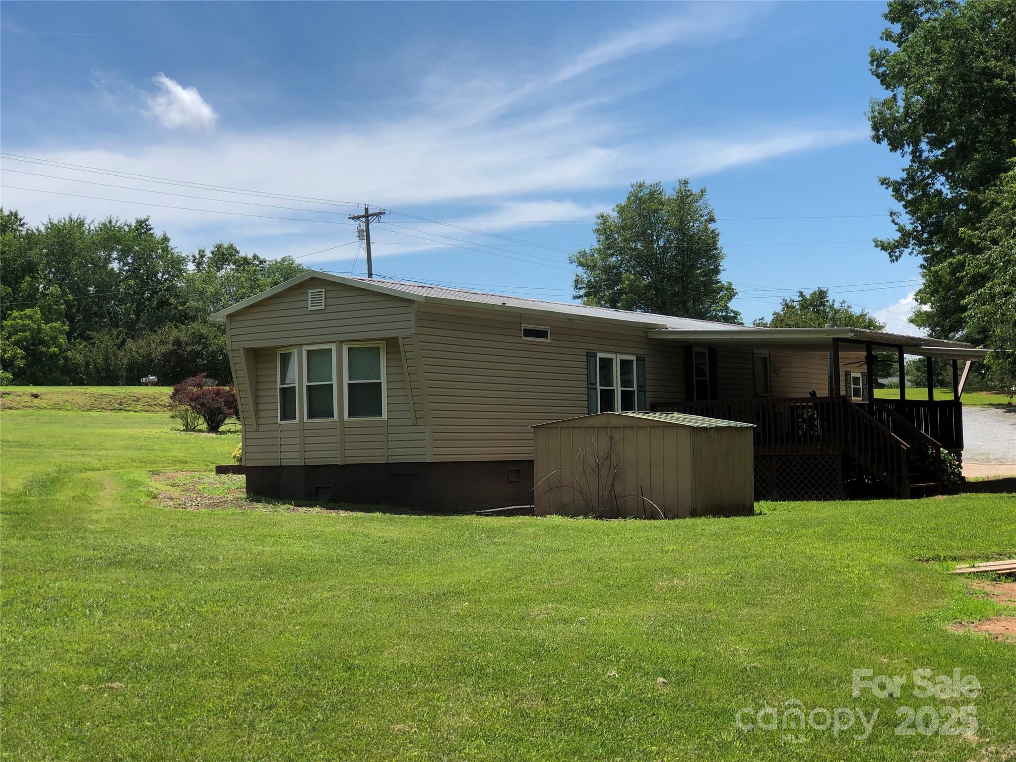 717 Pine Mountain Road Hudson, NC 28638 - Photo 3 of 31 a front view of house with yard and green space