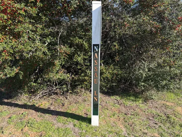 a sign that is on the side of a road