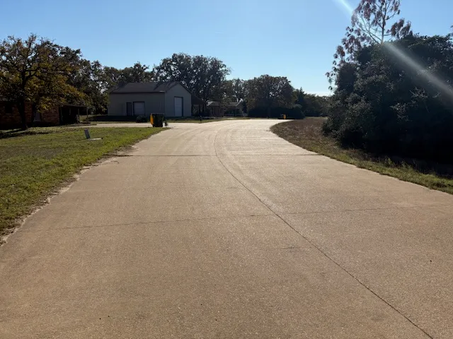 a view of an outdoor space and tennis court
