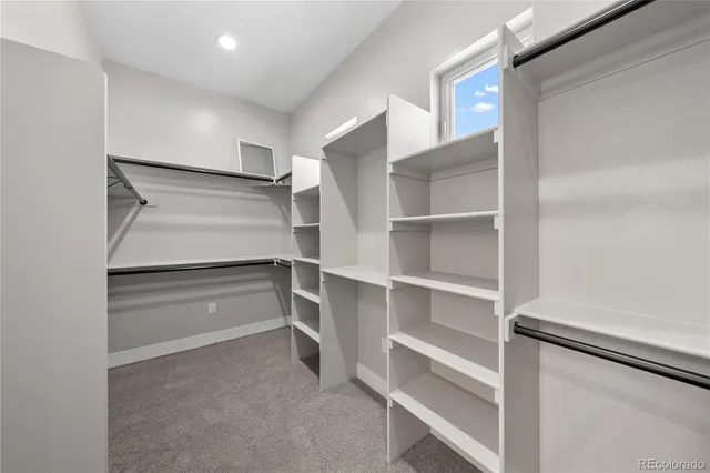 a storage room with washer and dryer