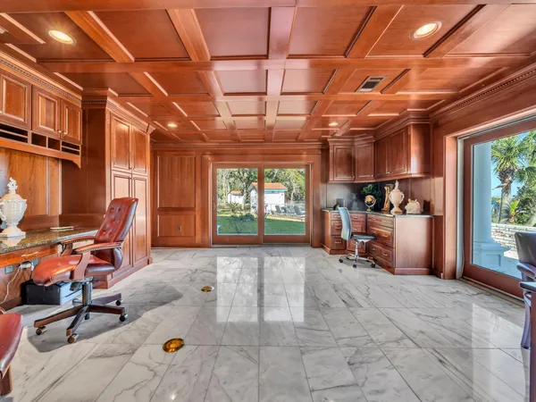 a view of building with garden space