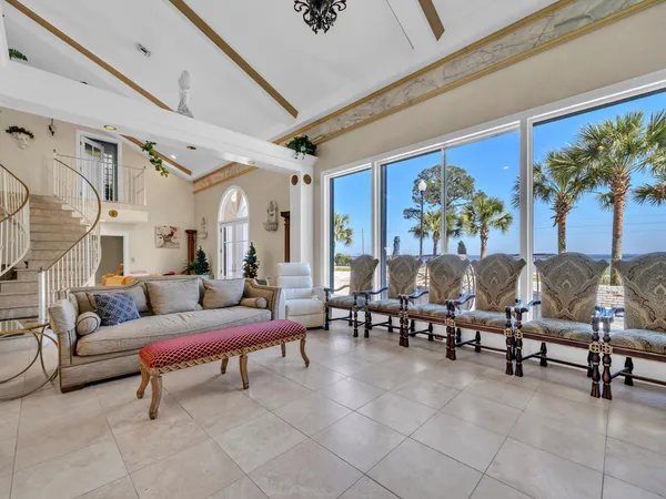 a kitchen with stainless steel appliances kitchen island granite countertop a sink and a stove