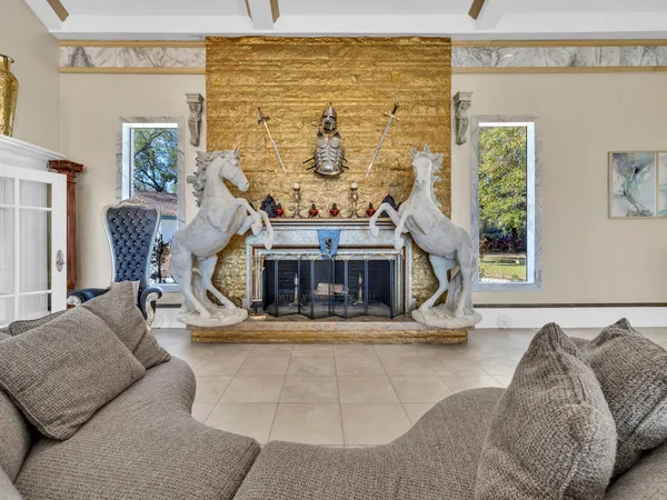 a kitchen with a sink and a large window