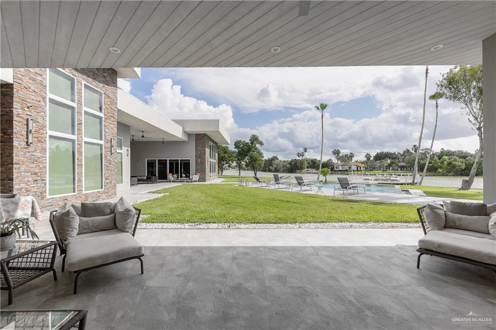 1500 Coffee Port Road Brownsville, TX 78521 - Photo 32 of 42 a view of swimming pool is middle in the middle of a yard