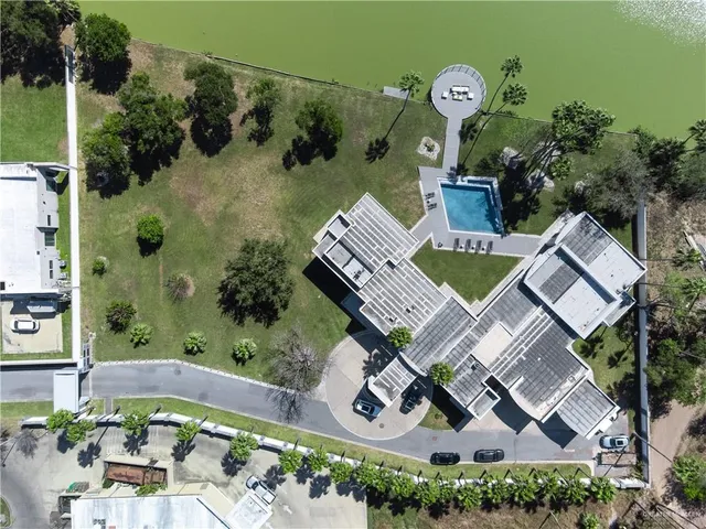 an aerial view of a house with garden space and outdoor space