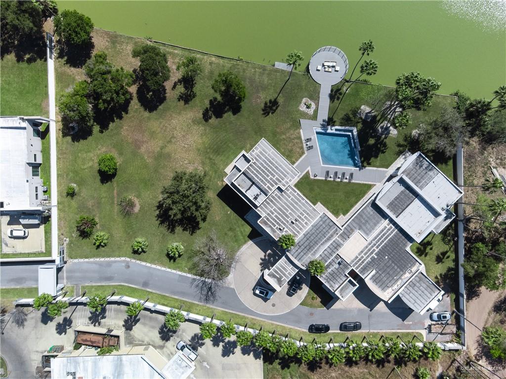 1500 Coffee Port Road Brownsville, TX 78521 - Photo 37 of 42 an aerial view of a house with garden space and outdoor space