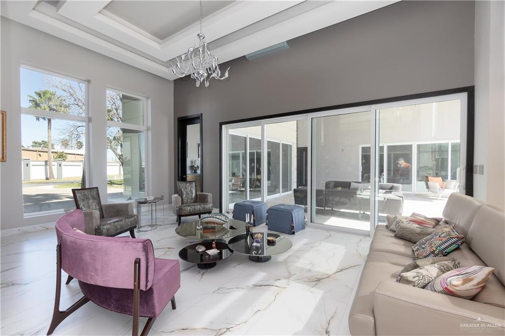 1500 Coffee Port Road Brownsville, TX 78521 - Photo 8 of 42 a living room with furniture and large windows
