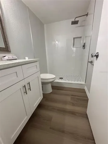 a bathroom with a toilet and a sink
